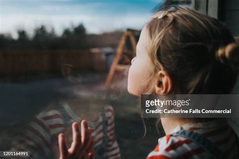 Pressing Nose Against Window Photos And Premium High Res Pictures