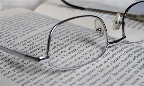 Book And Glasses Written Words Never Die