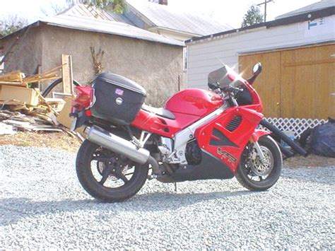 The shop claims that the kit is compatible with cbr250r and cbr300r, and that the rack can hold givi e21 or e22 cases. Honda VFR750 with Givi E21 hard cases