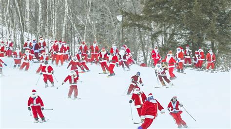 Skiing Santas Party Lap Maine Ski Resort For Charity Event