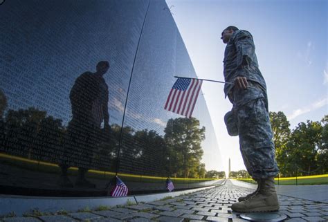 Soldier reflects and Vietnam Memorial wall | Article | The United States Army