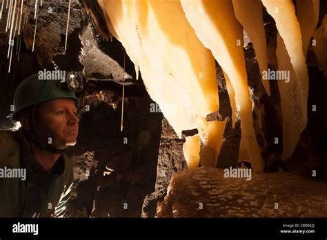 A Caver With Formations In Ogof Ffynnon Ddu South Wales Stock Photo