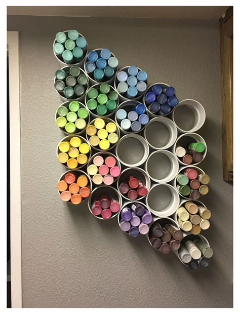 There Are Many Different Colored Crayons On The Wall