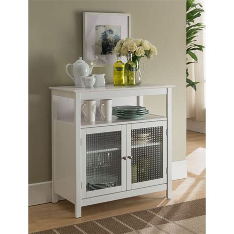 Features two (2) doors and and two (2) interior shelves; Ezra White Wood Contemporary 2 Door Accent Kitchen Cabinet with Storage - Walmart.com - Walmart.com