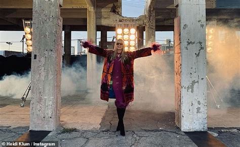heidi klum flaunts her sense of style in a colorful coat on set of germany s next top model in