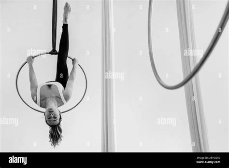 A Colombian Aerial Dancer Shows Off Her Acrobatics Skills On Aerial Hoop During A Training