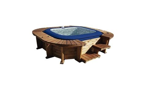 Jacuzzi als teil von einem großen swimmingpool. Whirlpool mit Holzumrandung Malibu K2O 250x275x71 cm — Brycus