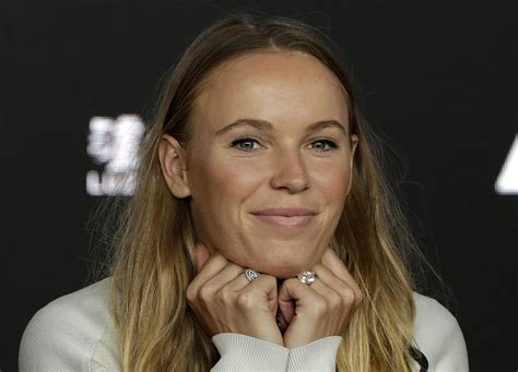 Click here for a full player profile. Champions Caroline Wozniacki, Roger Federer on different ...