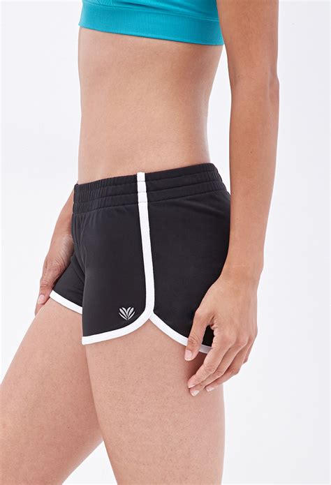 forever 21 active athletic dolphin shorts in black lyst