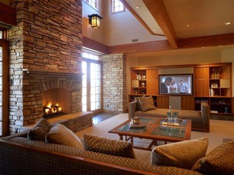 Here's some layout help for living rooms of all shapes. Country-Style Living Room With Stone Fireplace | HGTV