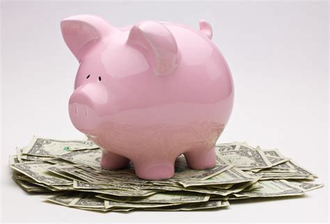 Pink Piggy Bank On Top Of A Pile Of One Dollar Bills Flickr Photo