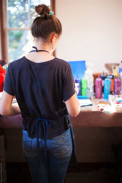 Teen Girl In An Art Studio Painting By Stocksy Contributor Carolyn Lagattuta Stocksy