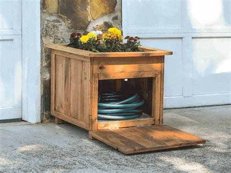 A hose is an essential part of every yard or garden but can be a nuisance if you don't have a place to store we all have a garden hose. Build a beautiful garden hose storage with planter!