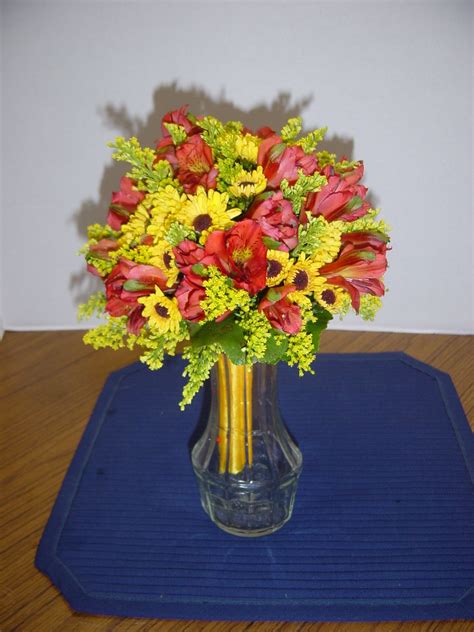 Dahlias are breathtakingly gorgeous, symmetrical flowers that many brides want in their wedding bouquet. Fall Wedding: Bridesmaids' bouquet of alstromeria, Viking ...