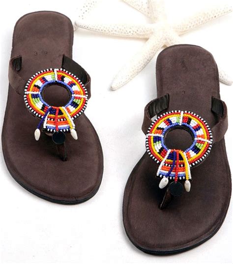 Find the perfect bedroom slippers stock photos and editorial news pictures from getty images. aspiga.com | Masai Multi Leather Beaded Sandals | African ...