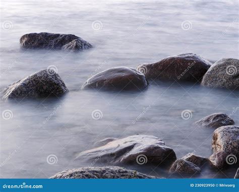 Large Smooth Boulders On The Shore Stock Photo Image Of Moist Ocean