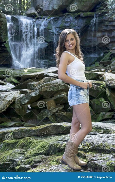 Beautiful Young Woman In White Tank Top And Denim Stock Image Image Of Water Smile 75068203
