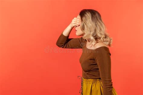 Woman Covered Her Eyes With The Hand Don`t Want To See This Stock
