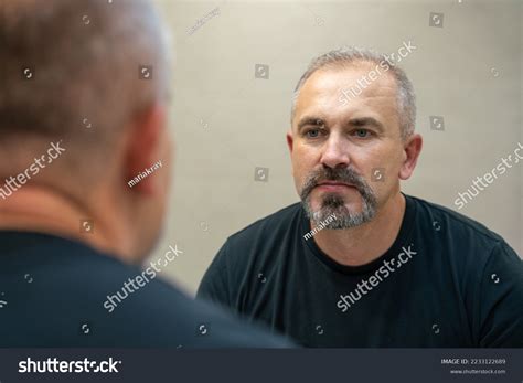 Middleaged Handsome Man Looking Mirror Bathroom Stock Photo 2233122689