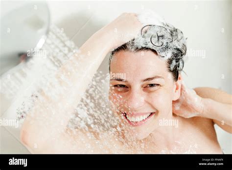 Shower Woman Happy Smiling Woman Washing Shoulder Showering In Stock Photo Alamy