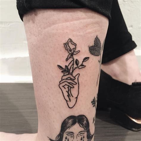 Rose tattoos for men usually come in different designs each of which the wearer can relate the meaning. The other half of my trade with @catewebb. A hand and rose ...