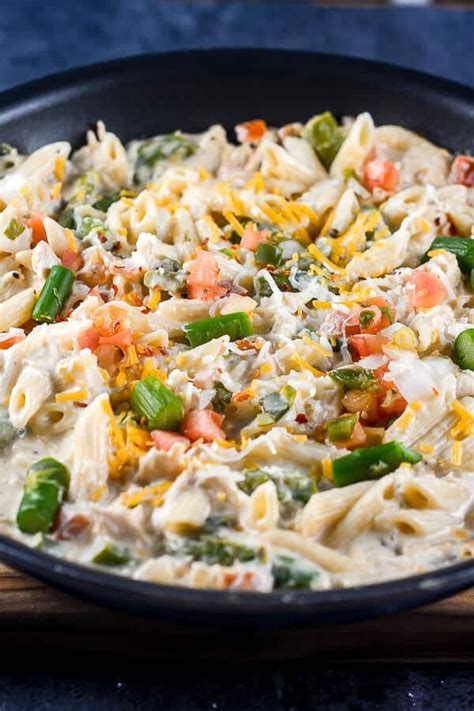 Cover and cook over medium heat for 5 minutes or until cheese is melted and chicken is cooked thoroughly (internal temperature of 165 degrees f or 75 degrees c). Cheesy Chicken Skillet Pasta is an easy 30-minute one pot ...