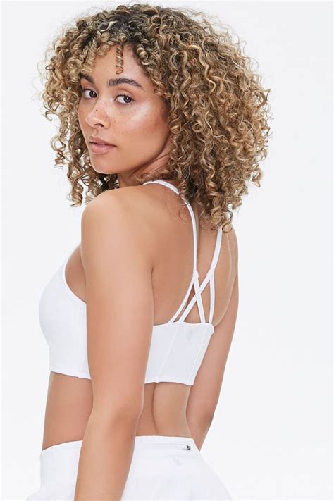We also carry swimwear knits, athletic mesh, dazzles knits and other performance fabrics. Active Cropped Strappy Cami in 2020 | Knit crop top, Cami ...