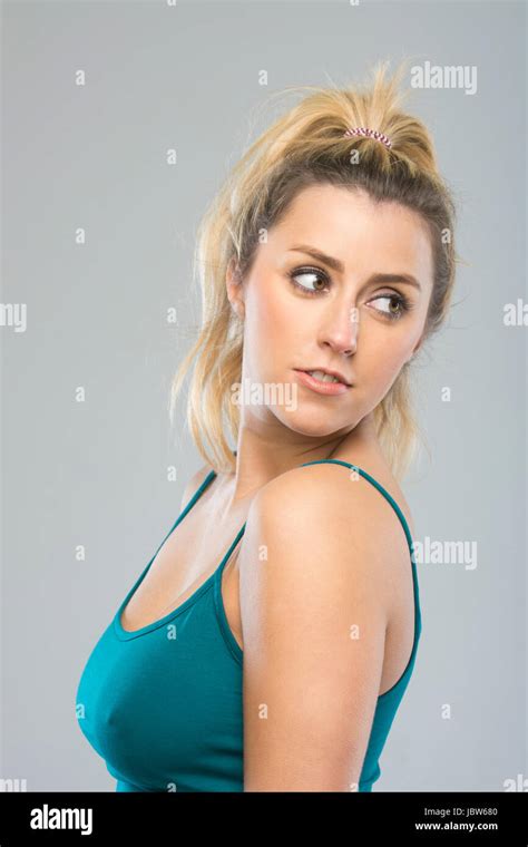 Beautiful Young Woman Looking Over Shoulder Stock Photo Alamy