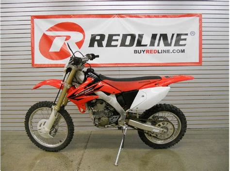 Removing this should not change the performance of the bike, but it will lighten it by 13.25 ounces in my case. 2006 Honda CRF250X for sale on 2040-motos