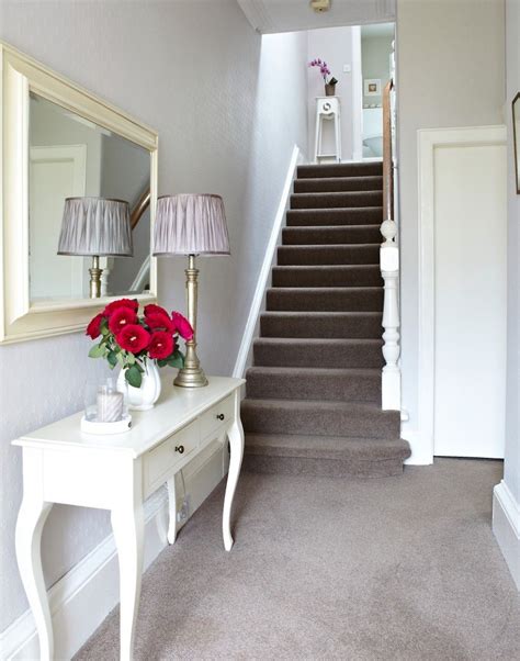 White Traditional Hallway With Taupe Carpet And French Style Console