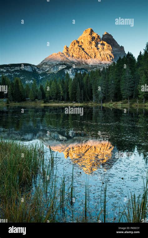 The Tre Cime Di Lavaredo Reflected In Lago Di Antorno Dolomite