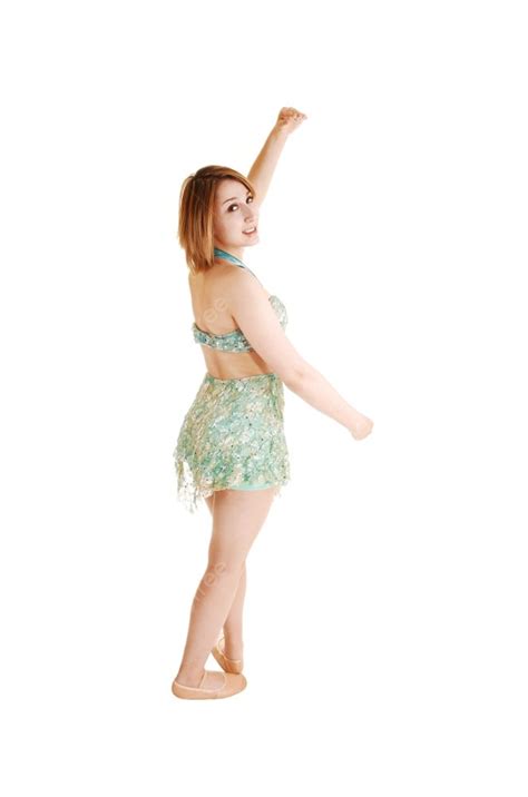 A Pretty Young Ballet Girl Standing In The Studio Photo Background And