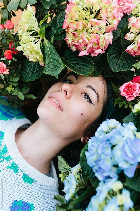 Smiling Woman Surrounded By Flowers By Stocksy Contributor Thais