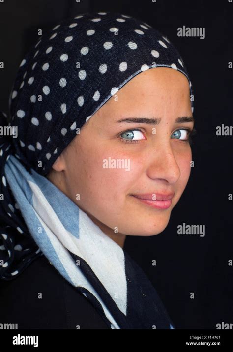 Close Up Of A Young Syrian Refugee Face With Blue Eyes Erbil