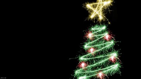 Did you know that you do not even need a black backdrop to create images with black backgrounds? Shimmering Christmas tree on Christmas, black background ...