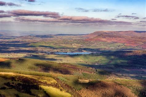 Late Afternoon Sunlight On The Rural Farmland And Hills In The Brecon