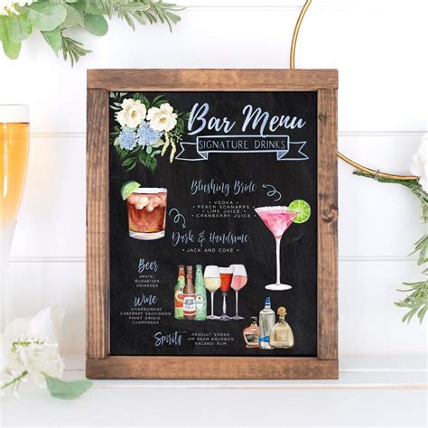 A Chalkboard Menu Board With Drinks And Flowers On The Table Next To