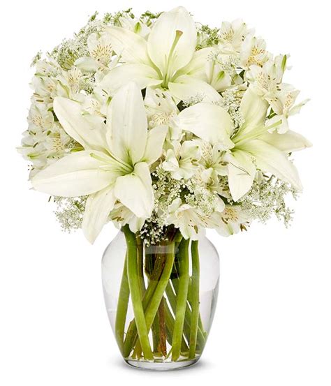 Add to your favorite vase or spread the joy by creating bouquets for the whole house! Ivory Memories at From You Flowers