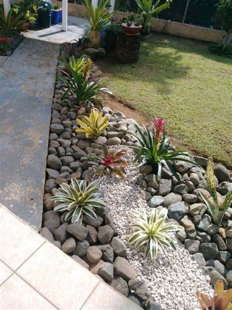 Add A Gravel Pond Through A Bed Of River Rocks River Rock Landscaping