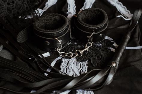 premium photo sexual toys for submission and domination in bdsm sex whip and handcuffs