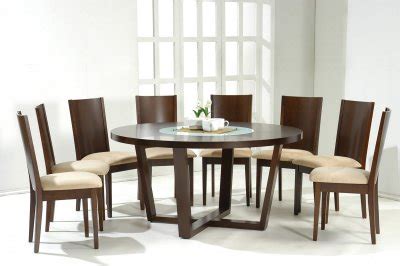 The options in table design are limitless. Dark Walnut Modern Round Dining Table w/Glass Inlay