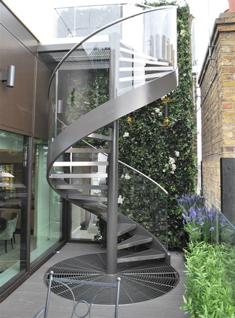 Center tube, railing, platform, and steps. Spiral Staircases