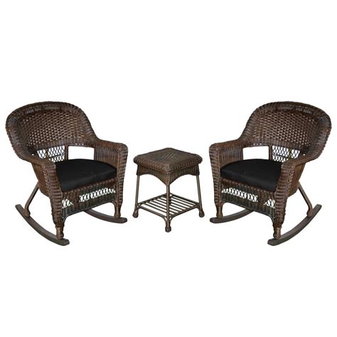 Palm leaves in a matte black container. 3pc Espresso Rocker Wicker Chair Set With Black Cushion