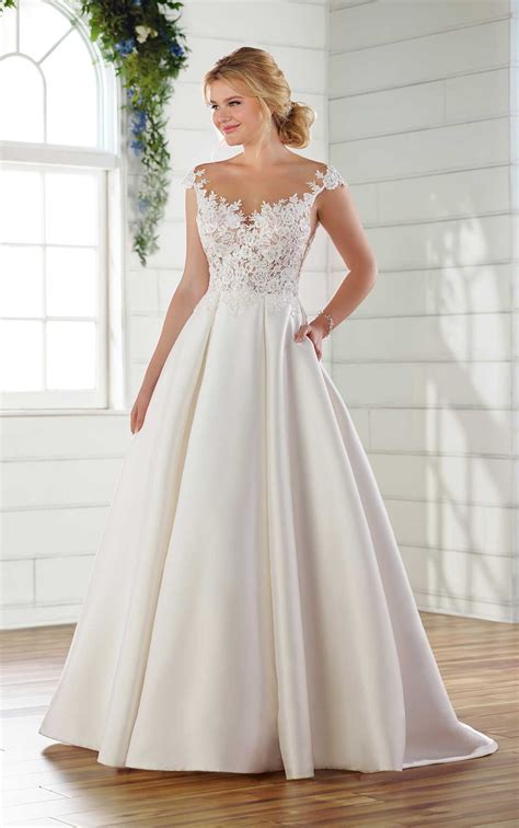 Informal wedding dresses and casual beach wedding dresses are perfect options for a destination wedding. Modern Ballgown Wedding Dress with Illusion Lace