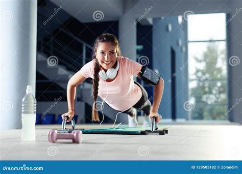 Strong Young Woman Doing Push Ups In Gym Stock Photo Image Of Leisure