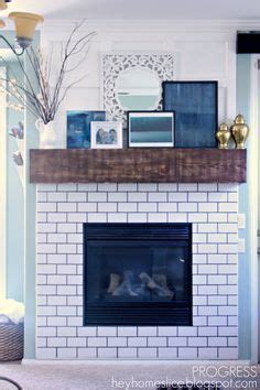 We were waiting on the top portion until we. Image result for fireplace with light grey subway tile ...