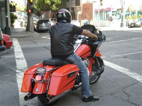 The batwing fairing also adds to the iconic and sleek design of the model. Bestand:2008 red Harley-Davidson FLHX Street Glide rear ...