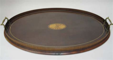 It also has a polish finish. Antique Oval Wooden Serving Tray marked 'E A S Maker ...