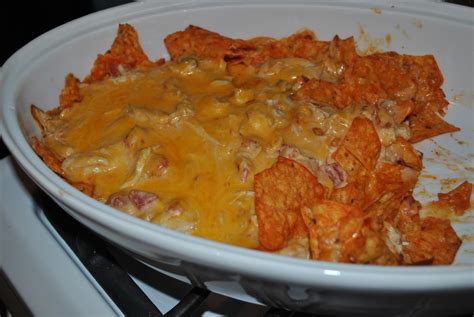 Doritos casserole with chicken is a creamy chicken casserole loaded with corn, green onions, cheese and doritos nacho chips. In this Crazy Life: Cheesy Chicken Dorito Casserole
