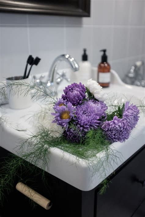 Bouquet Of Colorful Flowers In The Bathroom Stock Image Image Of